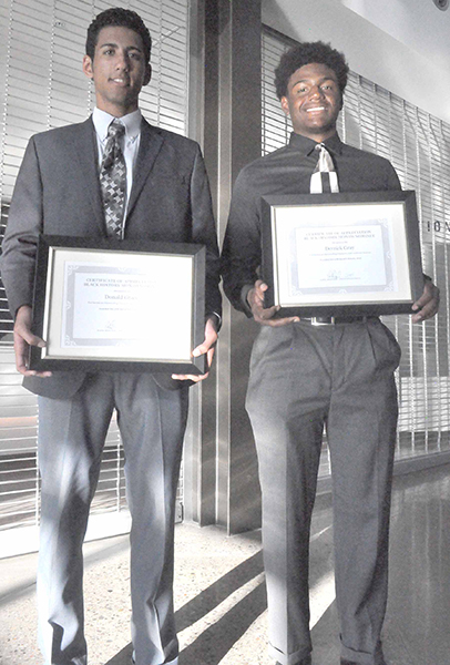 Donald Grace (left) of Maricopa High School and Derrick Gray of Apollo High School are among four senior nominated for Black History Month scholarships. Photo by Raquel Hendrickson