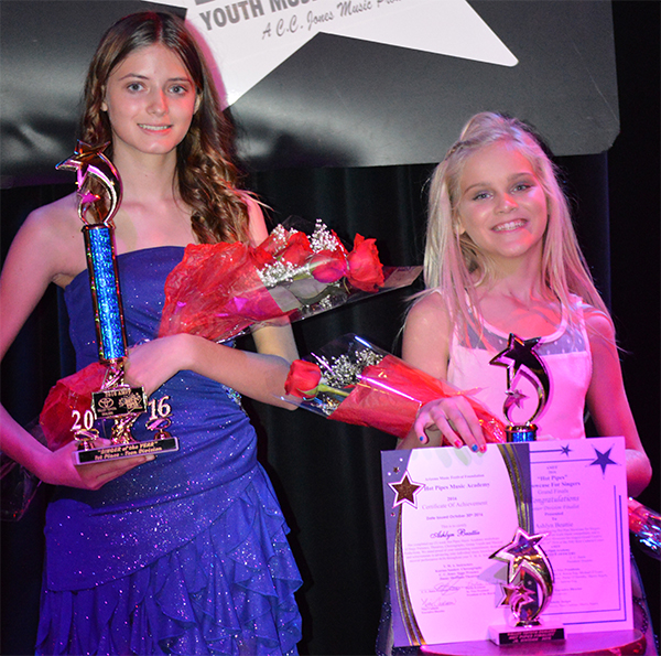 Fourteen-year-old Jaclyn Klank (left) won 1st place in the teen division at this year's fall Hot Pipes Showcase for Singers, while 11-year-old Ashlynd Beattie took home 2nd in the youth division. Submitted photo