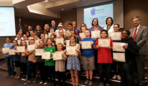Maricopa's 'Future Cities' competition state finalists stand with sponsors and MUSD board members at the Feb. 22 board meeting. Photo by Michelle Chance
