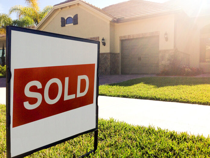 Real estate sold sign