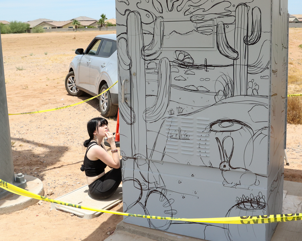 Anisa Burke sketches her design for "Friends of the Sonoran Desert" on June 8, 2023. [Brian Petersheim Jr.]