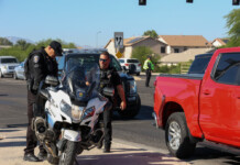 Three MPD officers seen responding to a pedestrian versus car accident on June 7, 2023. [Brian Petersheim Jr.]