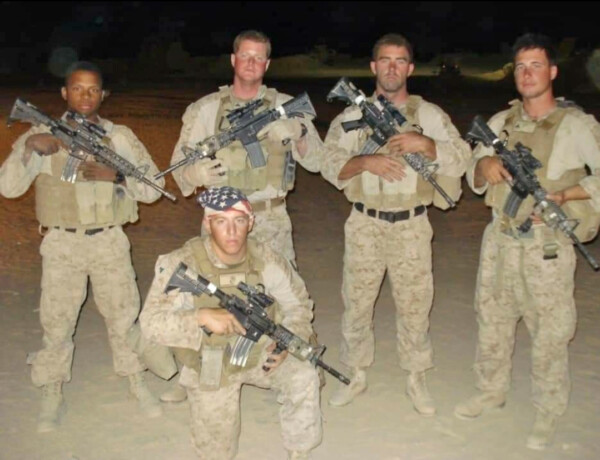 Zinnerman claimed to be in this photo, but he's not. These are U.S. Marines in Afghanistan in 2012. From left: Anthony Stewart, Patrick Beal, Zack Wilson, Joey DeGroot and Alec Tannenbaum (kneeling).[submitted]