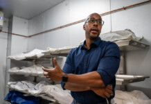 Andre Davis, medicolegal investigator supervisor at the Pinal County Medical Examiner’s Office, gives a tour of the facility. [Bryan Mordt]