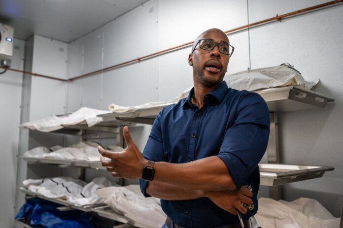 Andre Davis, medicolegal investigator supervisor at the Pinal County Medical Examiner’s Office, gives a tour of the facility. [Bryan Mordt]