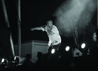Young MC works the crowd up at the Wild West Music Fest at Copper Sky Park. [Bryan Mordt]