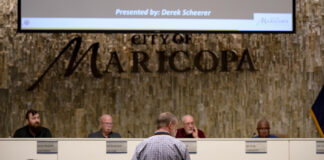City Planner Derek Scheerer presents a rezoning case during a Planning and Zoning Commission meeting on Nov. 13, 2023. [Monica D. Spencer]