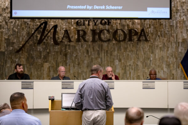 City Planner Derek Scheerer presents a rezoning case during a Planning and Zoning Commission meeting on Nov. 13, 2023. [Monica D. Spencer]