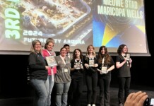 The Nieuwe Stad team from Maricopa Wells Middle School receives a third-place award at the 2024 Future Cities Regional Competition held at Arizona State University on Jan. 20, 2024. [Courtesy of MUSD]