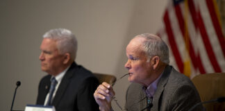 Arizona State Transportation Board members Ted Maxwell and Richard Searle listen during a meeting on Jan. 12 at Maricopa City Hall. The last meeting held in Maricopa took place in September 2022. [Monica D. Spencer]
