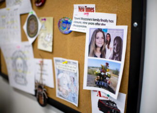 Photos, news headlines and other memorabilia are pinned to a board in Senior Medicolegal Investigator Suzi Dodt's office at the Pinal County Medical Examiner in Florence on Feb. 6, 2024. [Monica D. Spencer]